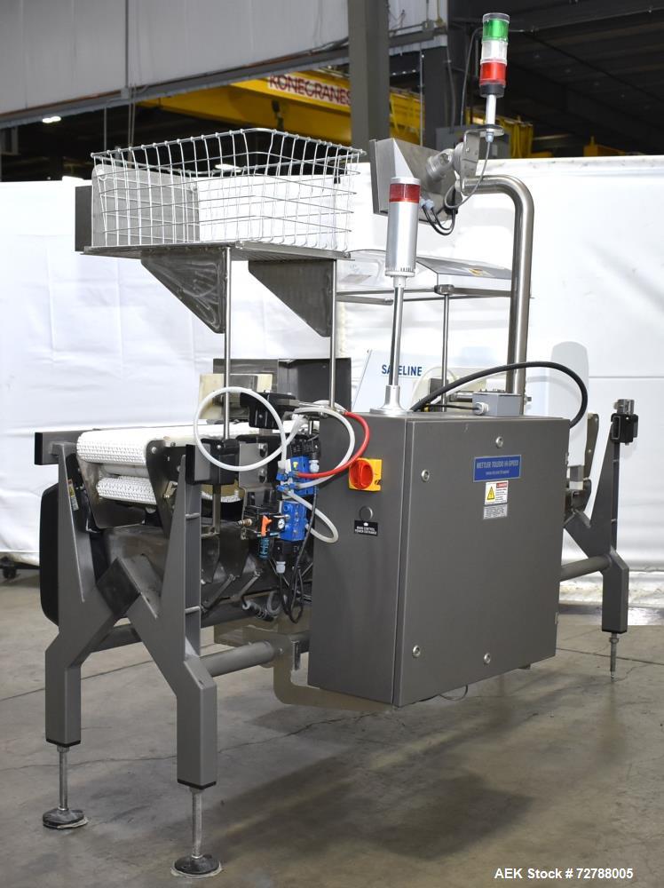 Used Mettler-Toledo Safeline Hi-Speed Model XE Combination Metal Detector and Checkweigher. Capable of speeds up to 500 packages per minute. Capable of weighing product up to 7kg. Approximate 7-3/4" ...